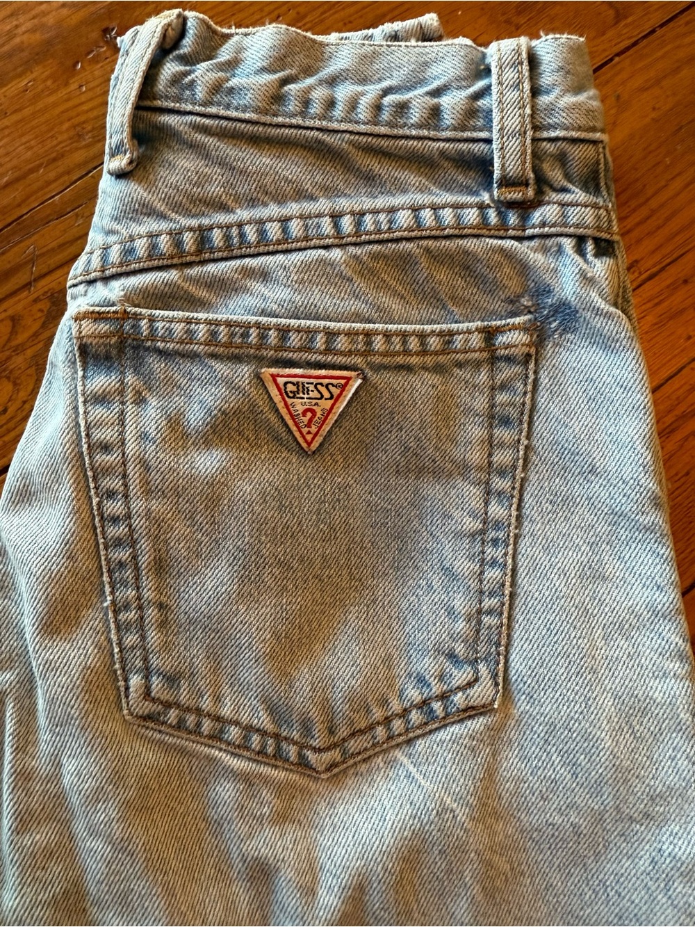 GUESS Light Blue Denim Jeans with Red Triangle Logo Patch